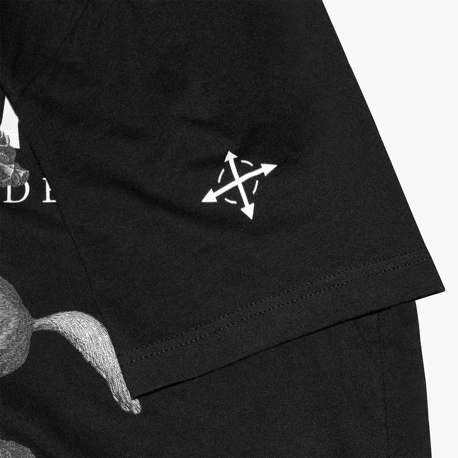 Compass arrow on sleeve of SAINTS WORLDWIDE t-shirt