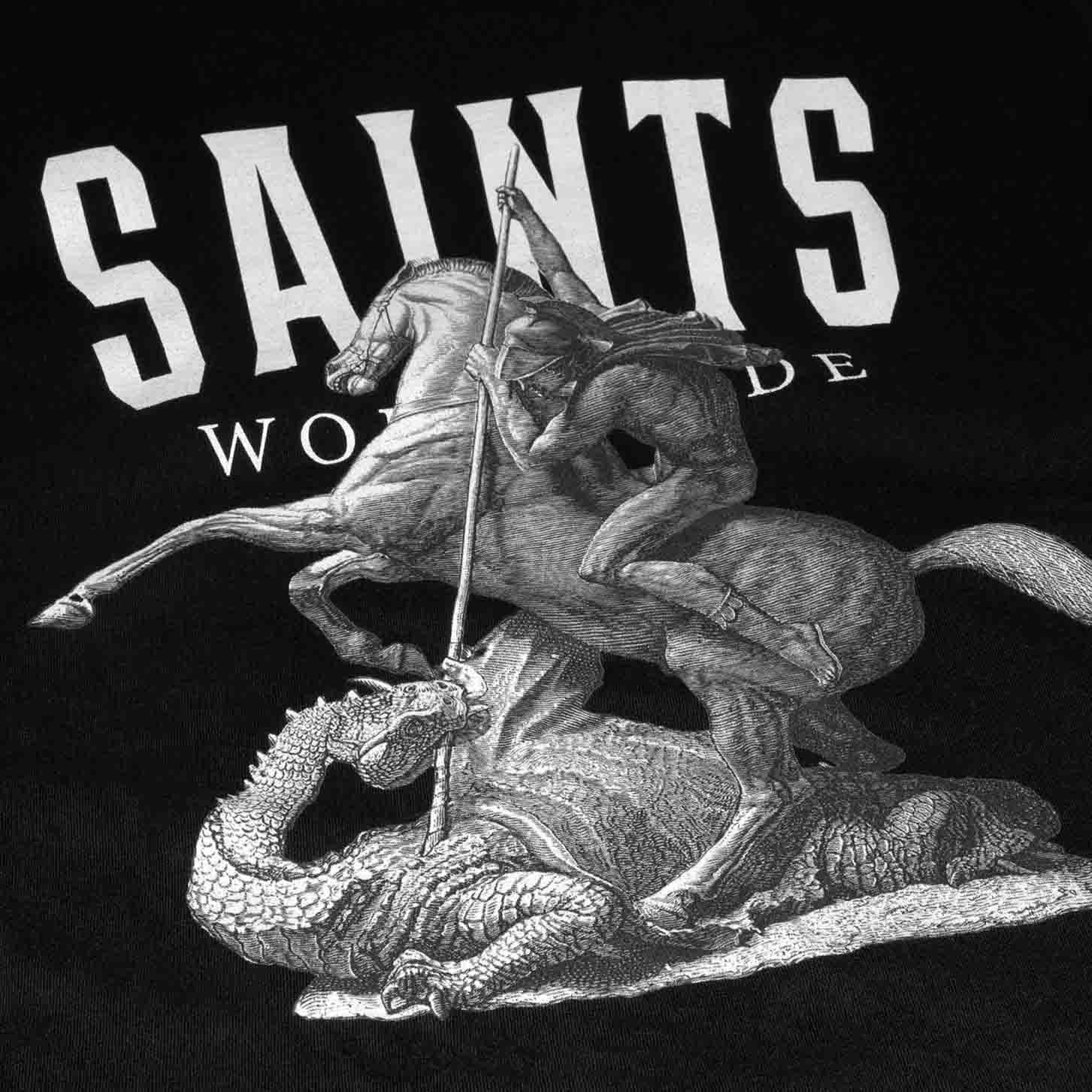 Close-up of Saint George embroidery on black tee