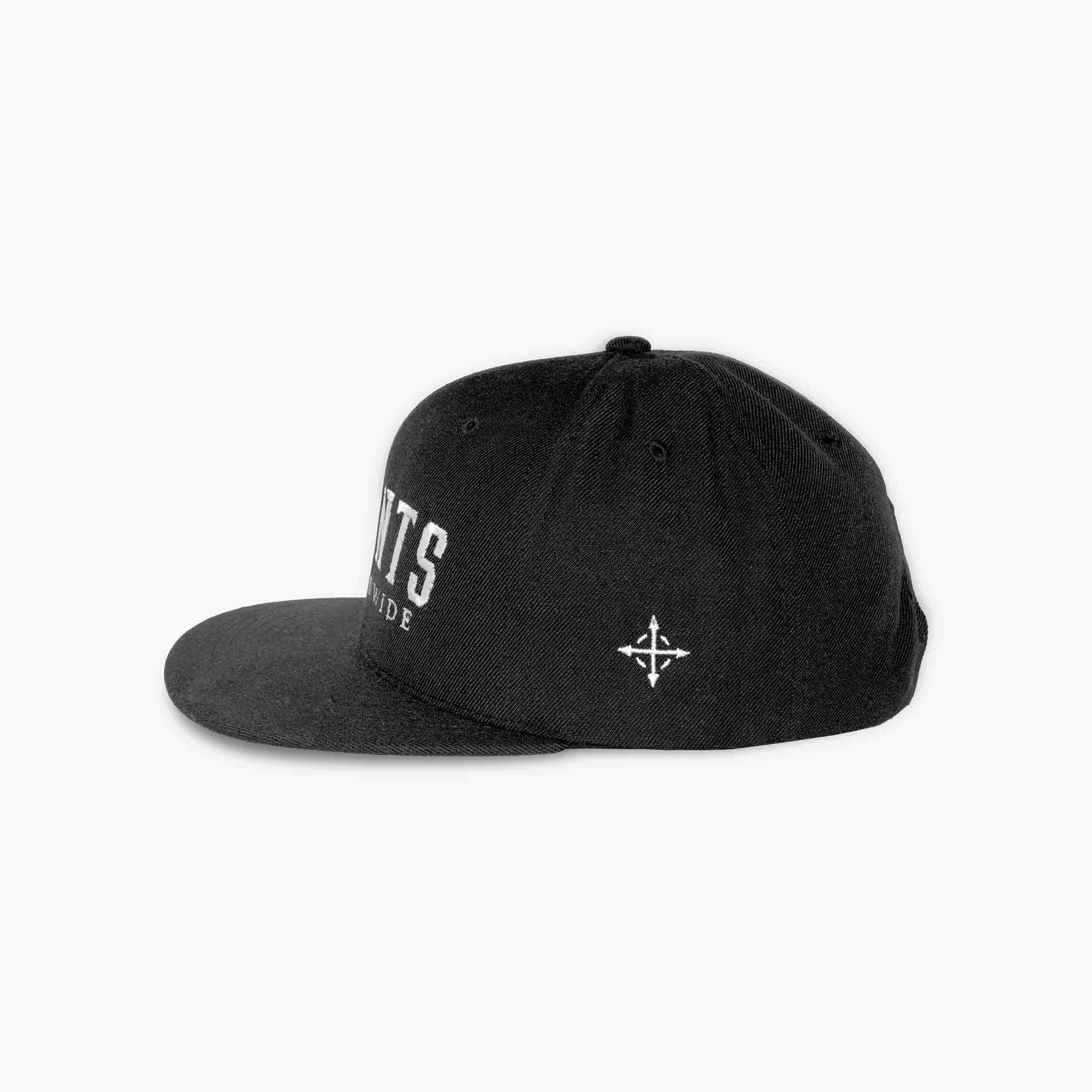 Side profile of snapback showing compass cross embroidery